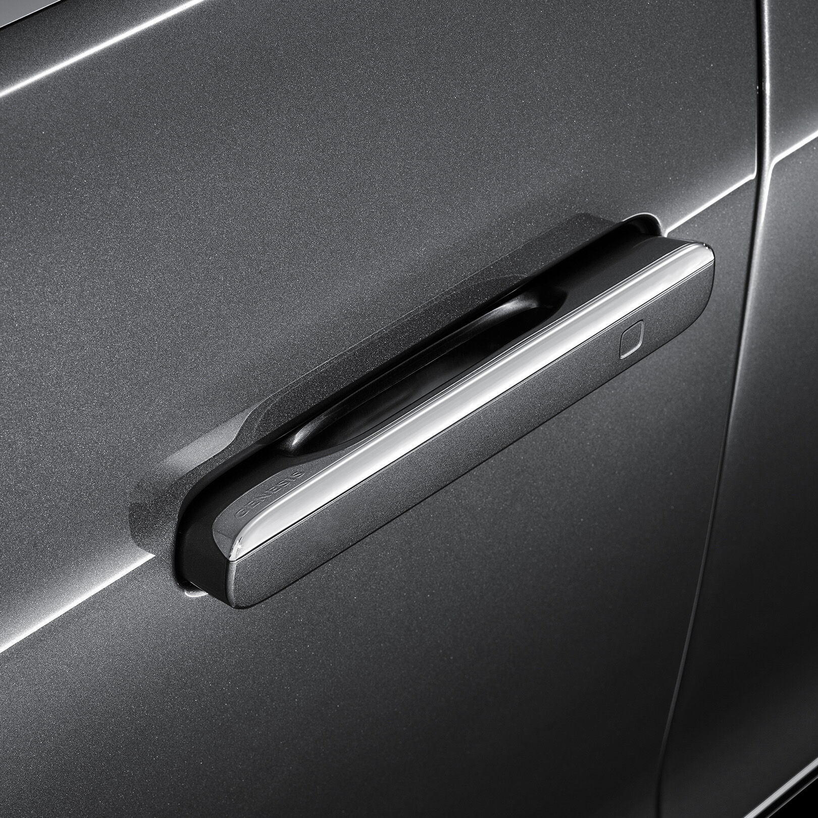 The auto flush door handle sticks out from the door.