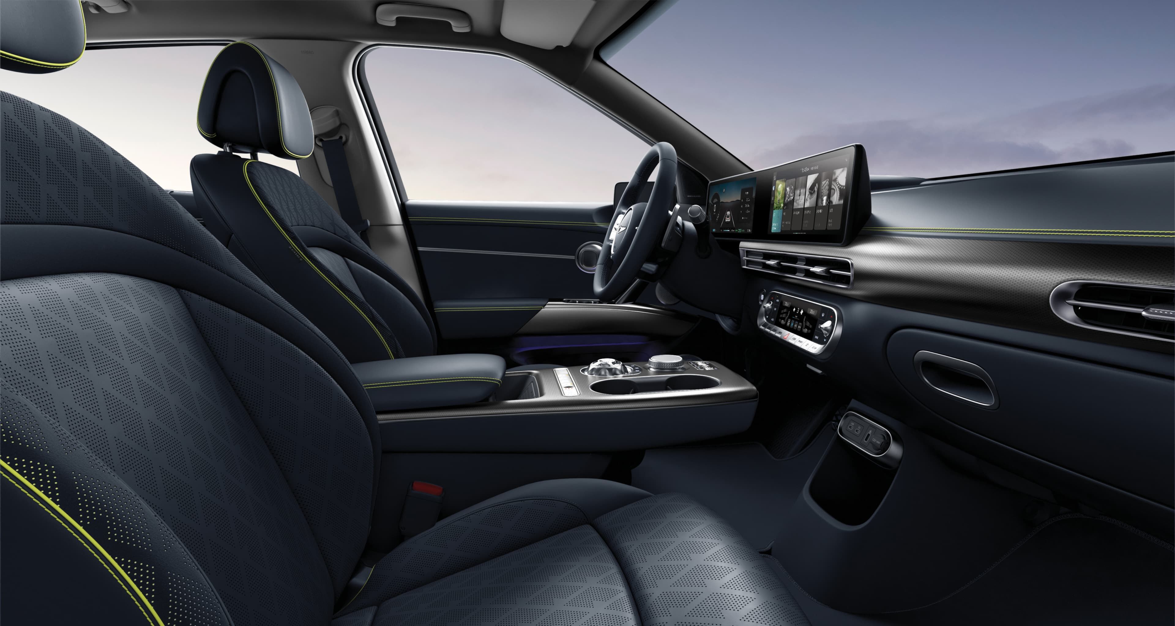 Looking at the driver's seat from the side of the passenger seat, GV60's interior in Torrent Navy Mono-tone.
