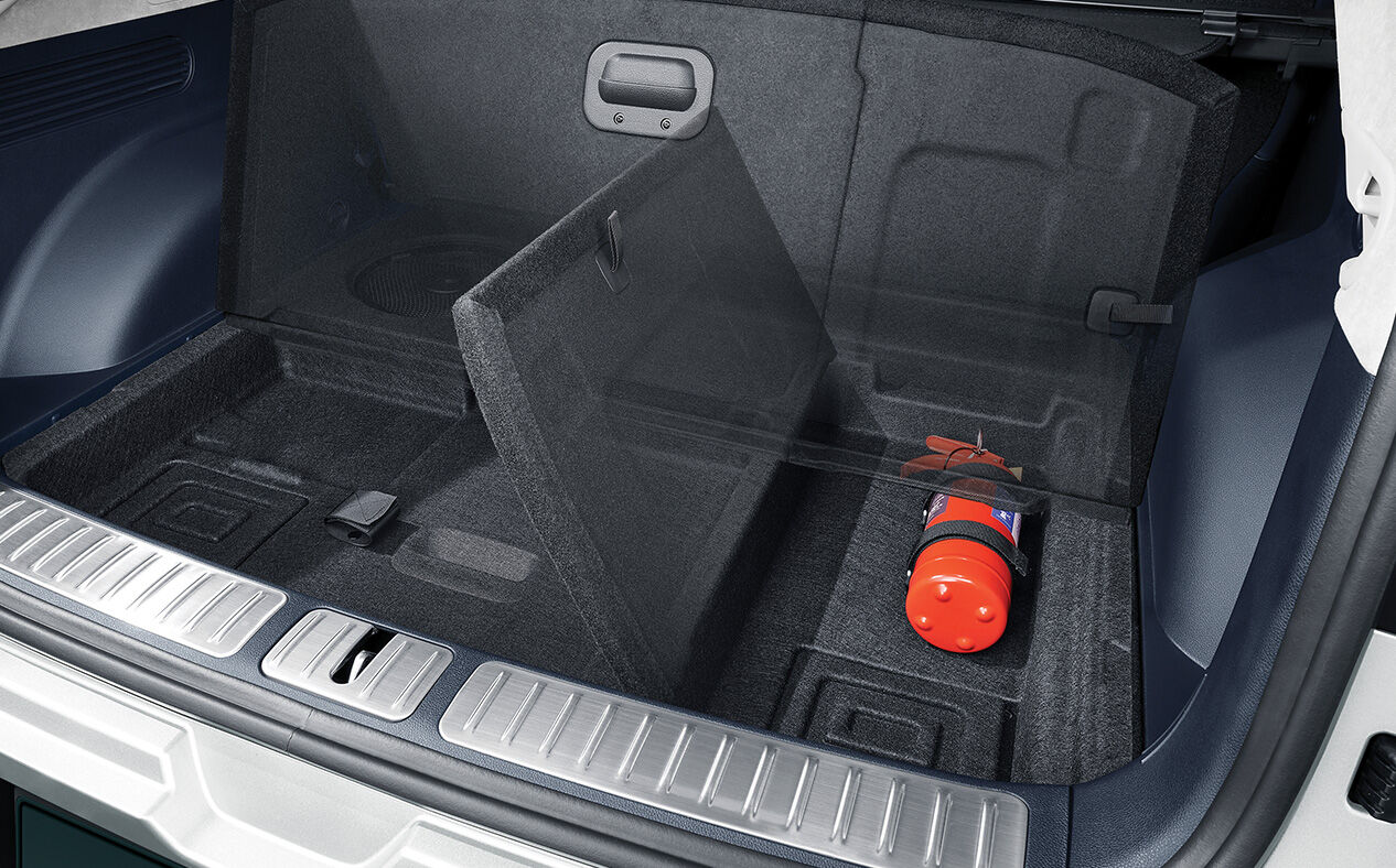 The multi-folding luggage board is open in GV60's trunk.