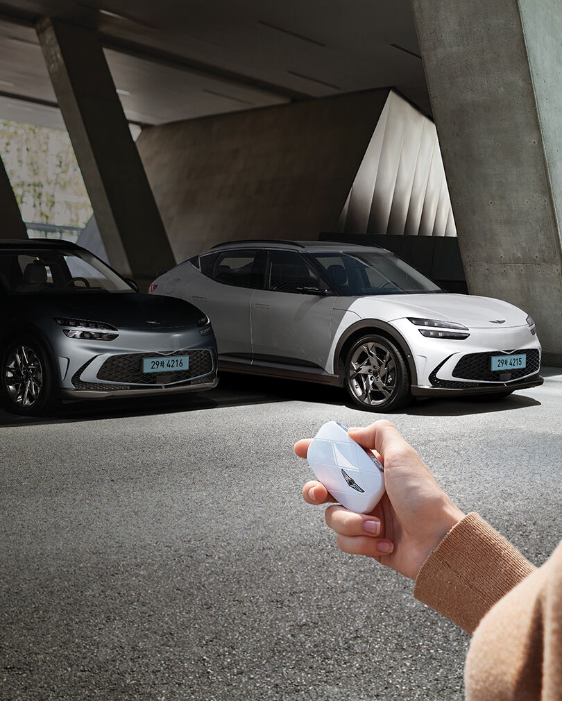 The car is being exited remotely using the smart key.