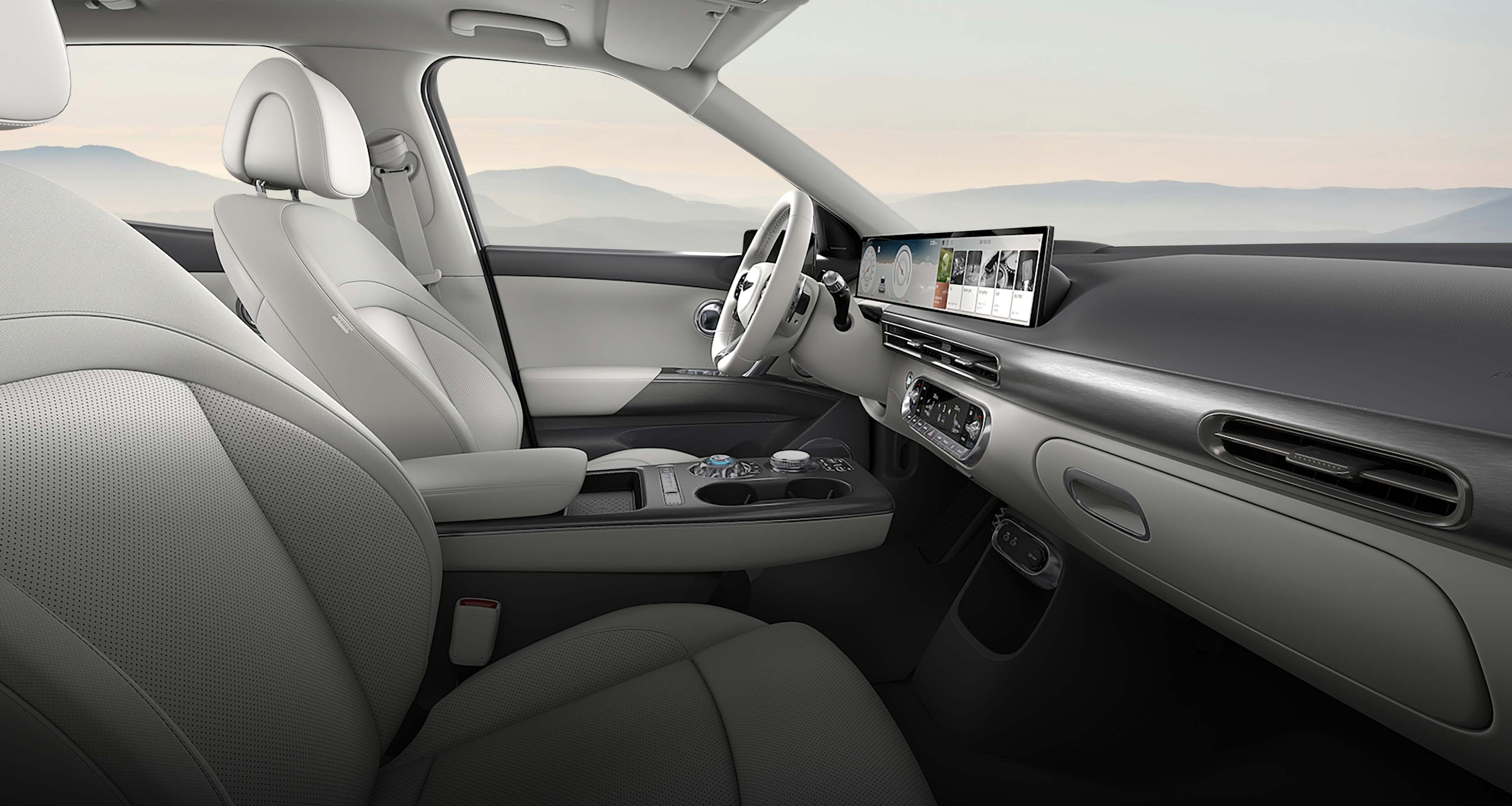 The interior of the GV60, featuring an Ash Gray/Glacier White Two Tone color.