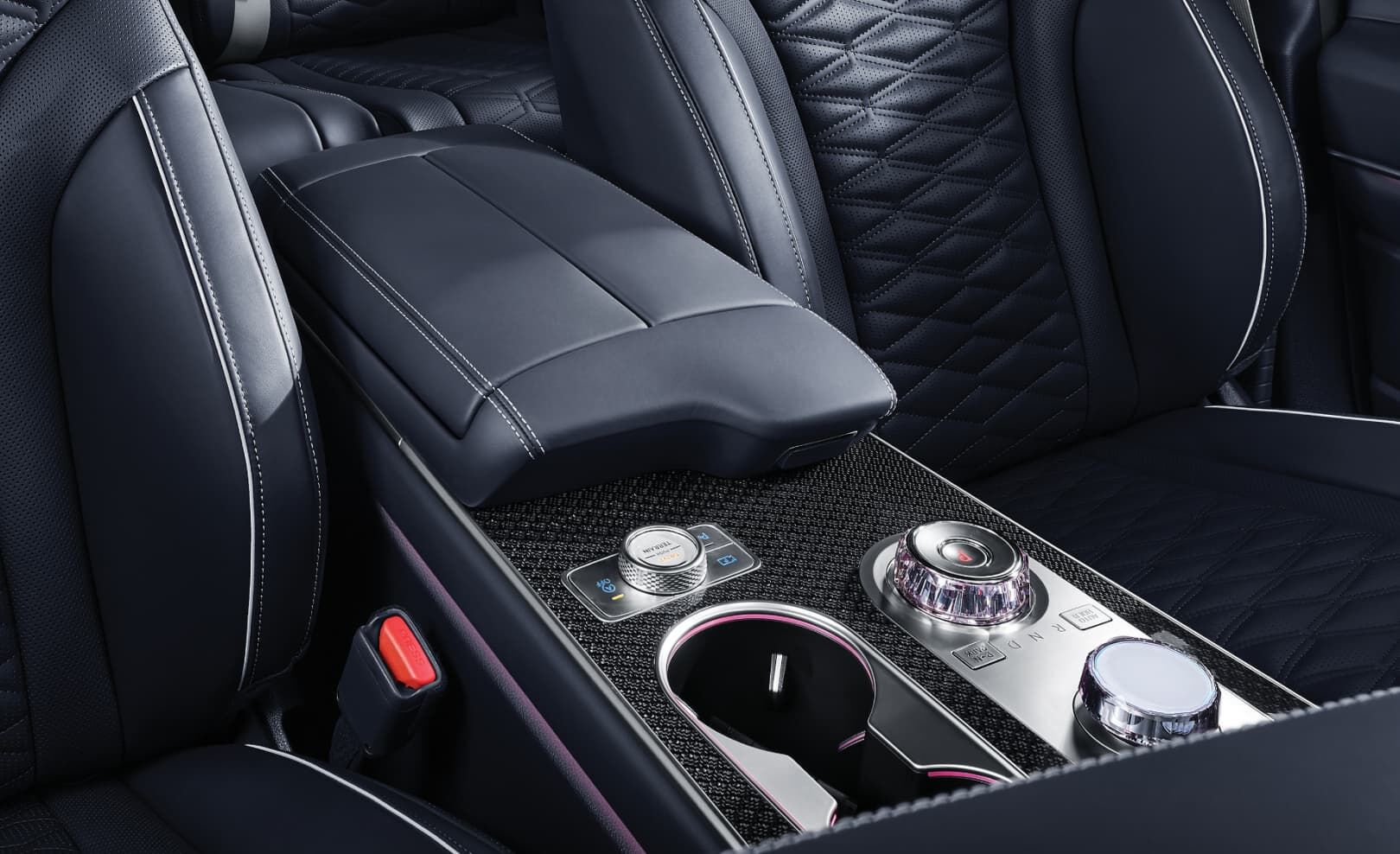 The front seat armrest.