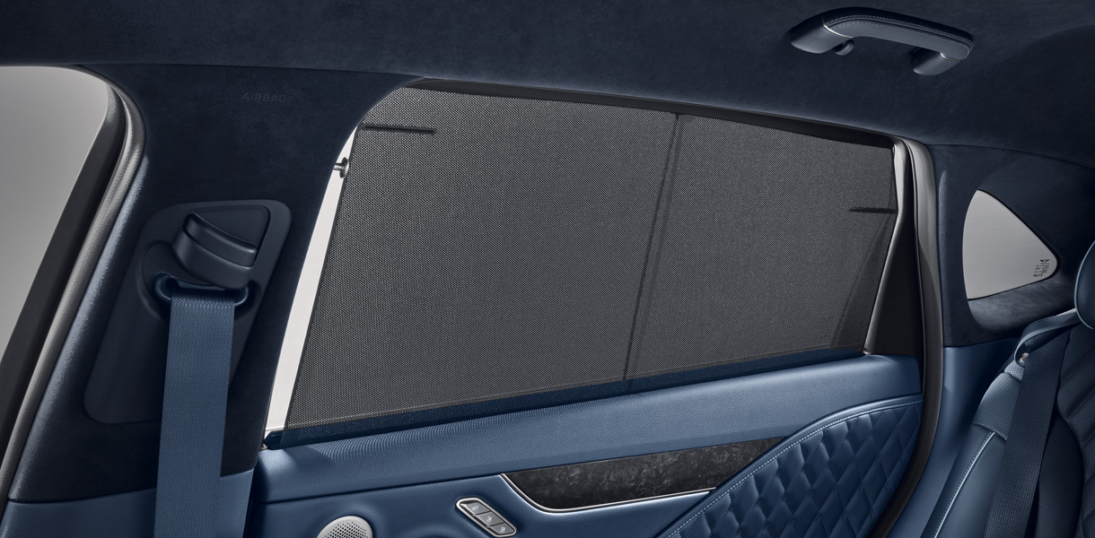 Power rear sunshades provide an added layer of luxury and privacy, effortlessly shielding rear-seat passengers from sunlight and glare