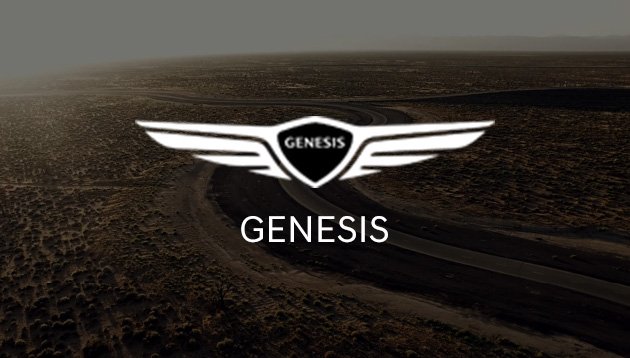 The distinctive Genesis emblem with wings is superimposed over a winding road in a desert