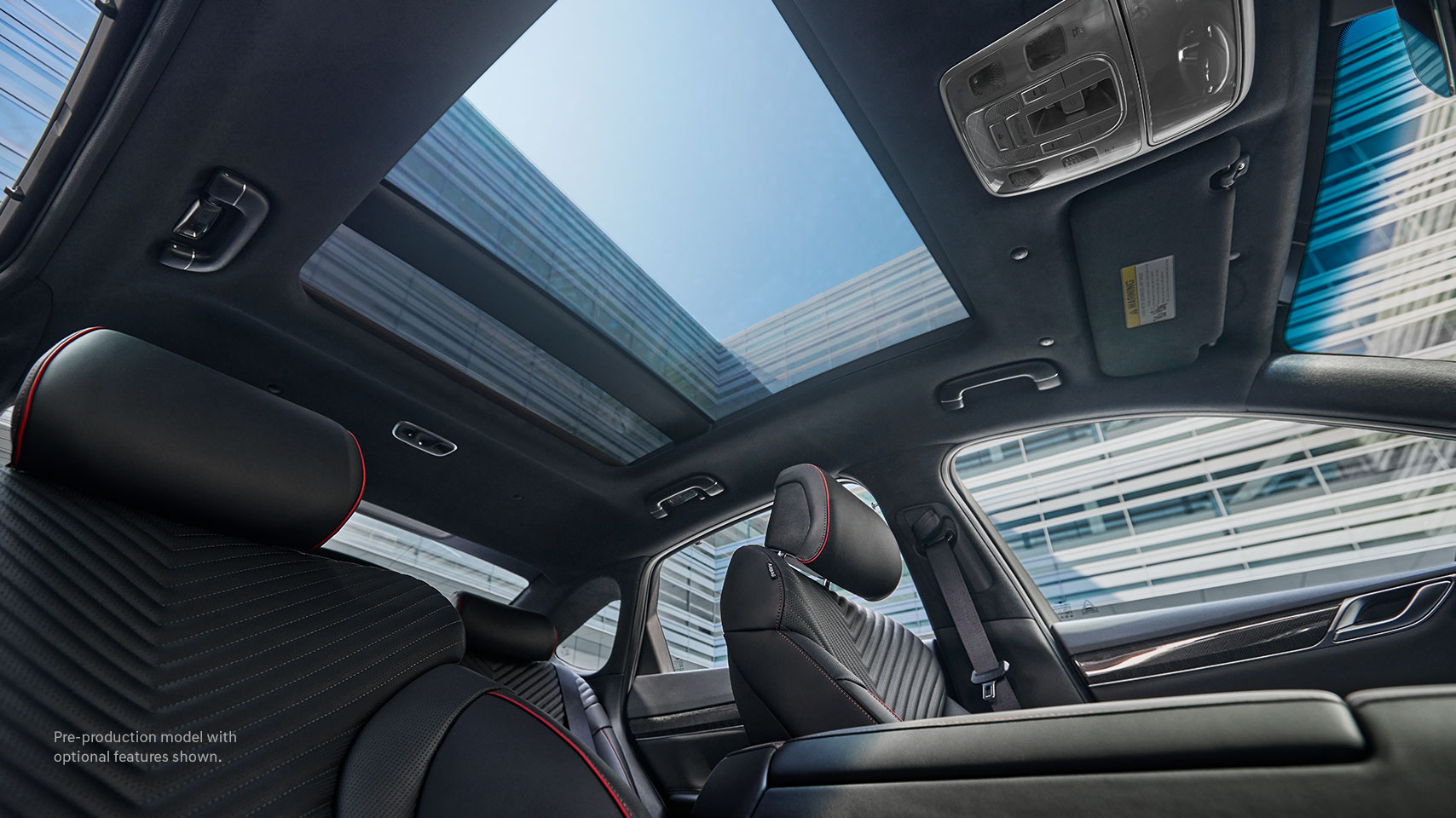 2022 Genesis G80 interior with open Panoramic Sunroof.