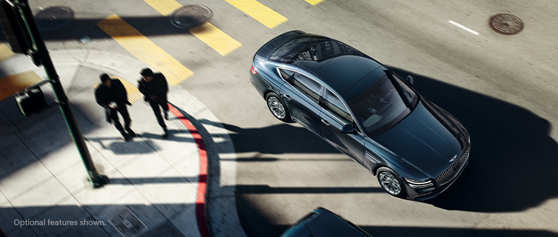 2023 Genesis G80 shown in Tasman Blue.