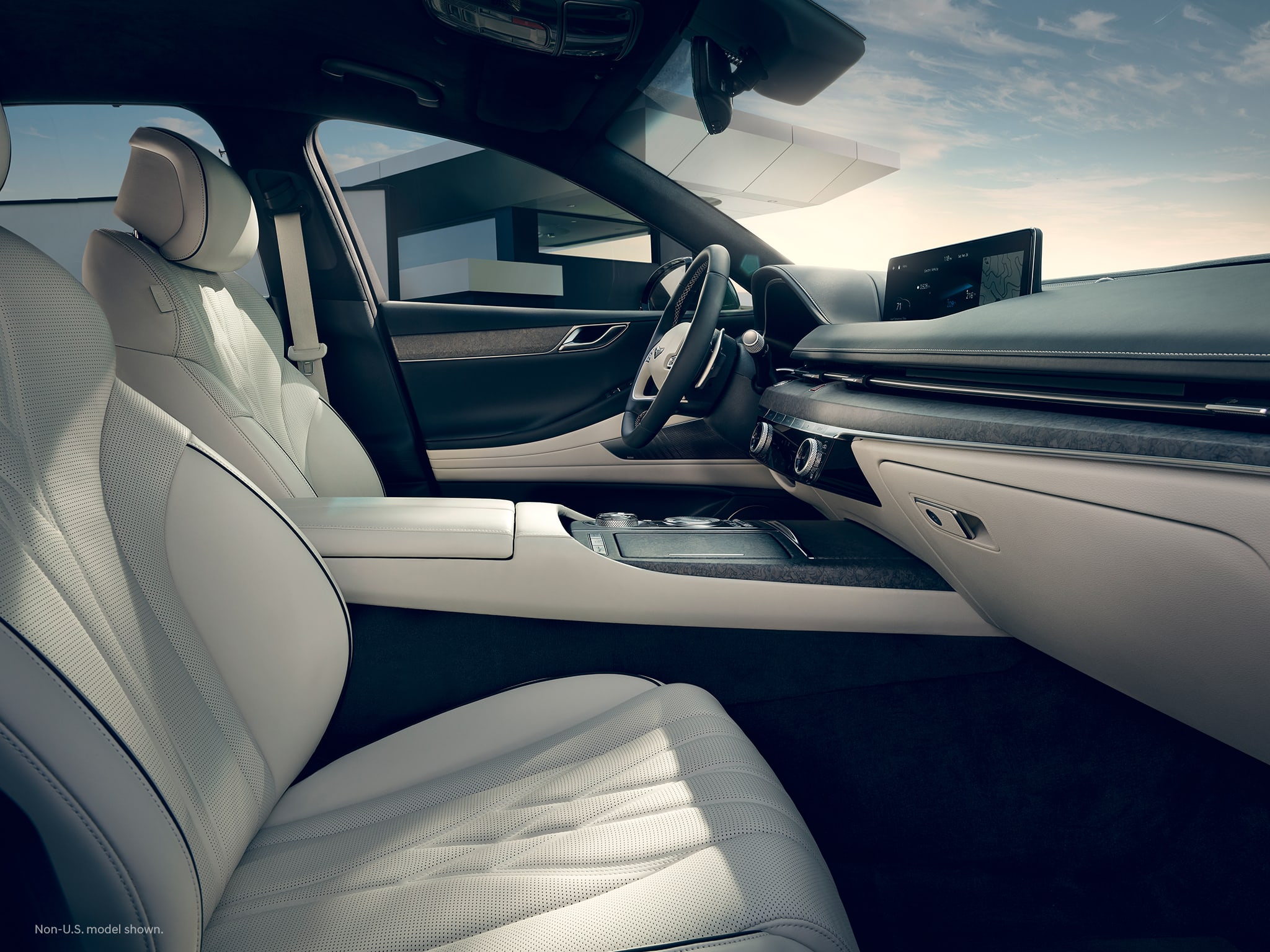 2023 Electrified G80 interior shown in Dark Lagoon Green / Glacier White