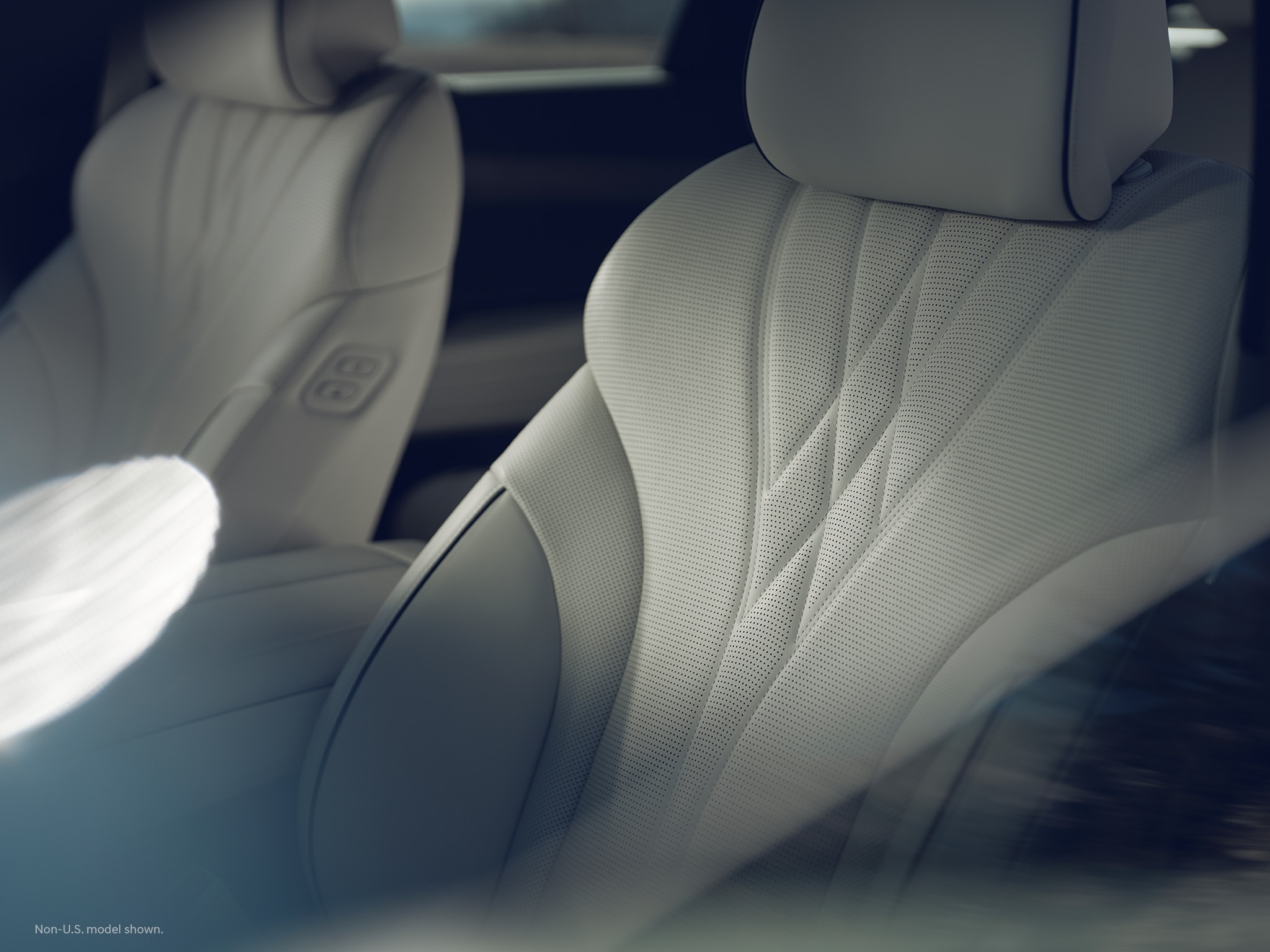 2023 Electrified G80 interior shown in Dark Lagoon Green / Glacier White