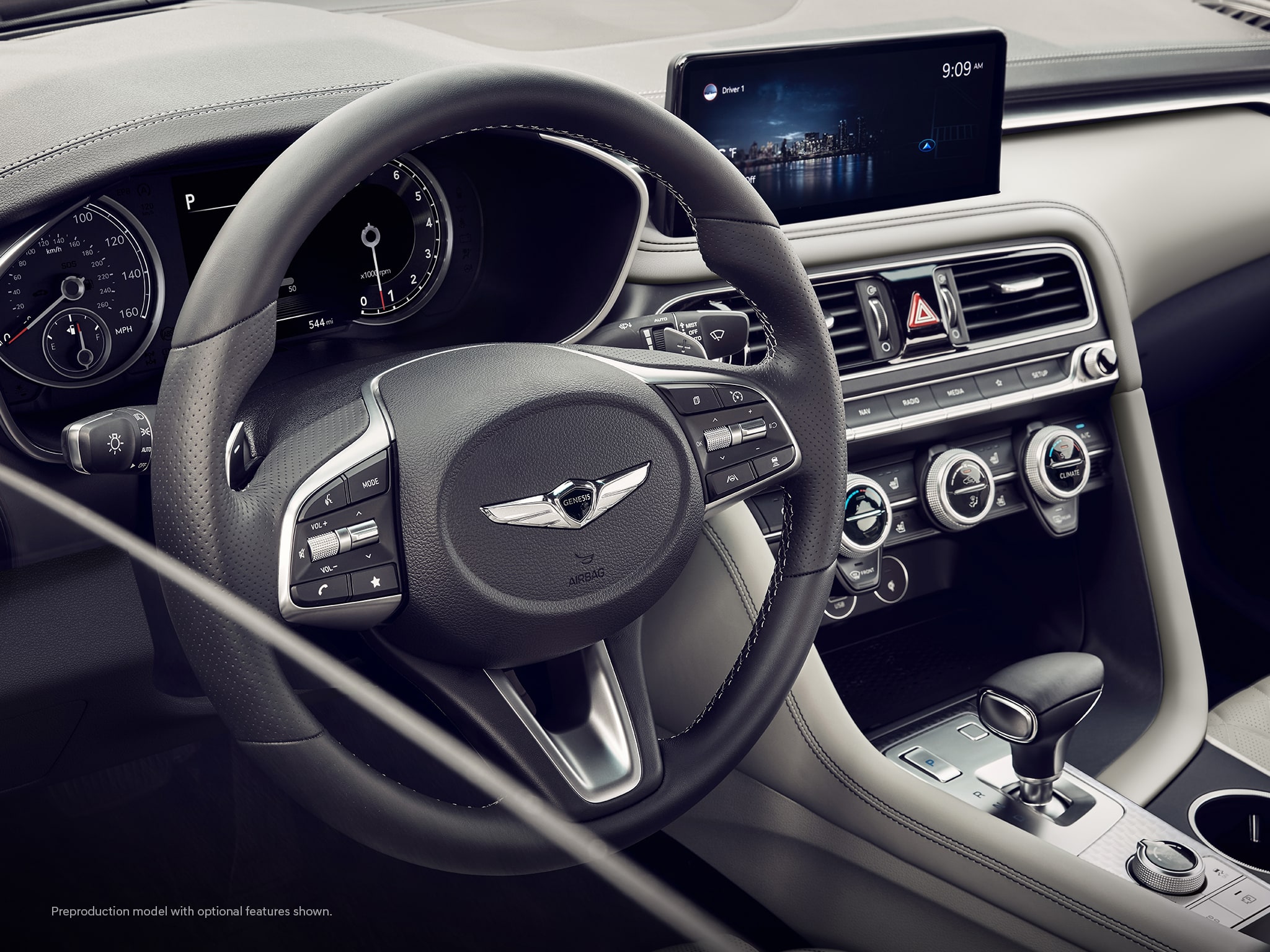 2023 Genesis G70 interior shown in Sandstorm Gray.