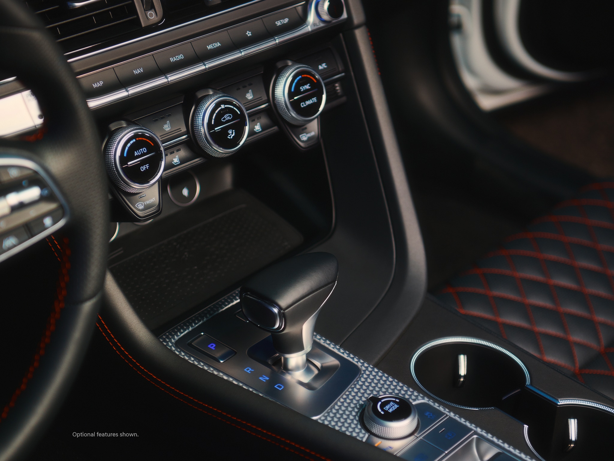 Bottom right - 2023 Genesis G70’s drive mode selection dial and advanced technology.