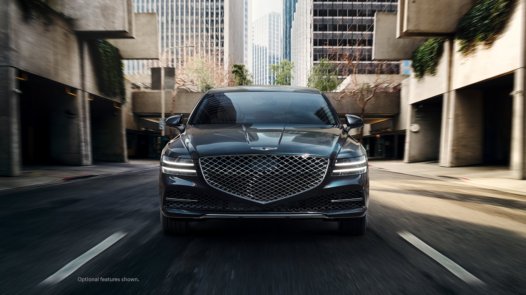 2023 Genesis G80 shown in Tasman Blue.