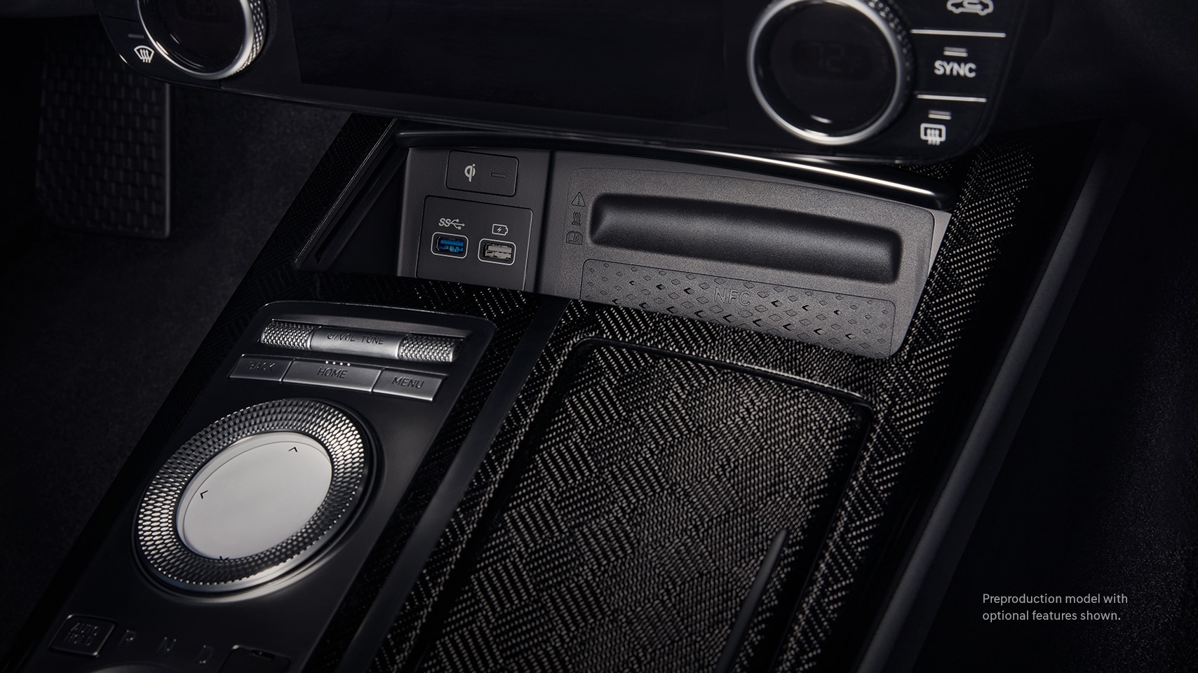 2023 Genesis G80 interior with wireless device charger.