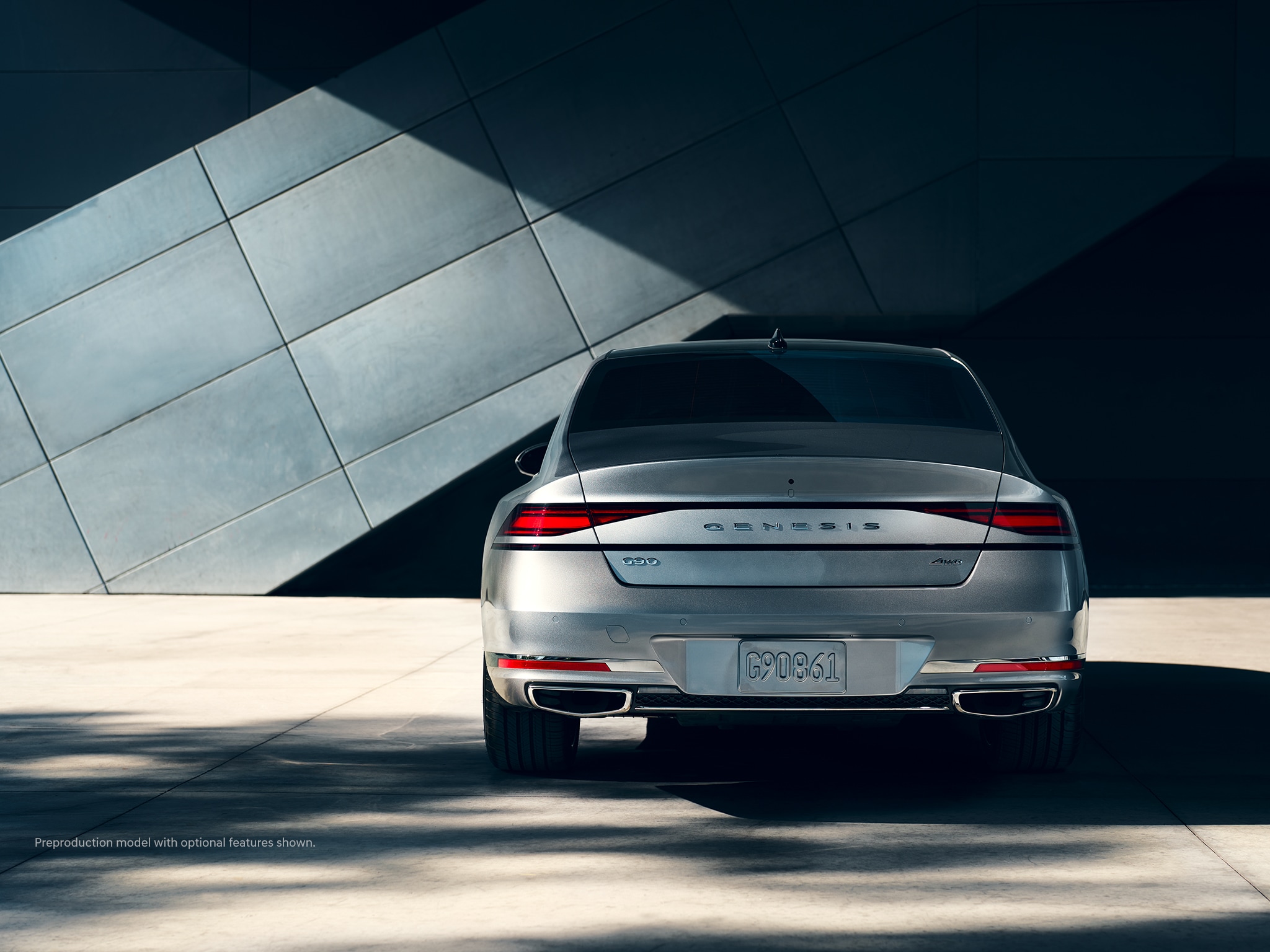 2023 Genesis G90 rear angle shown in Savile Silver.