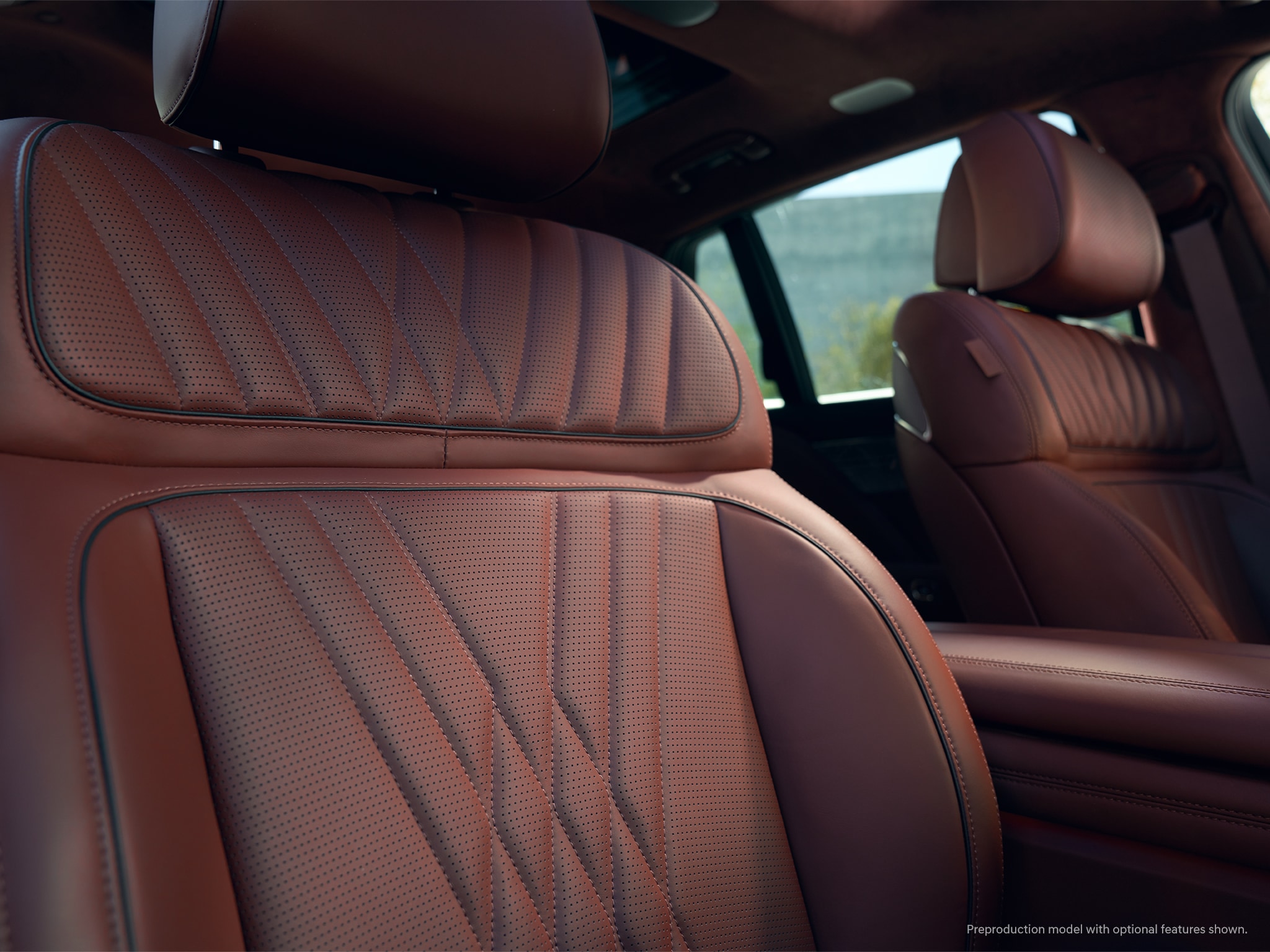2023 Genesis G90 interior shown in Bordeaux Brown.