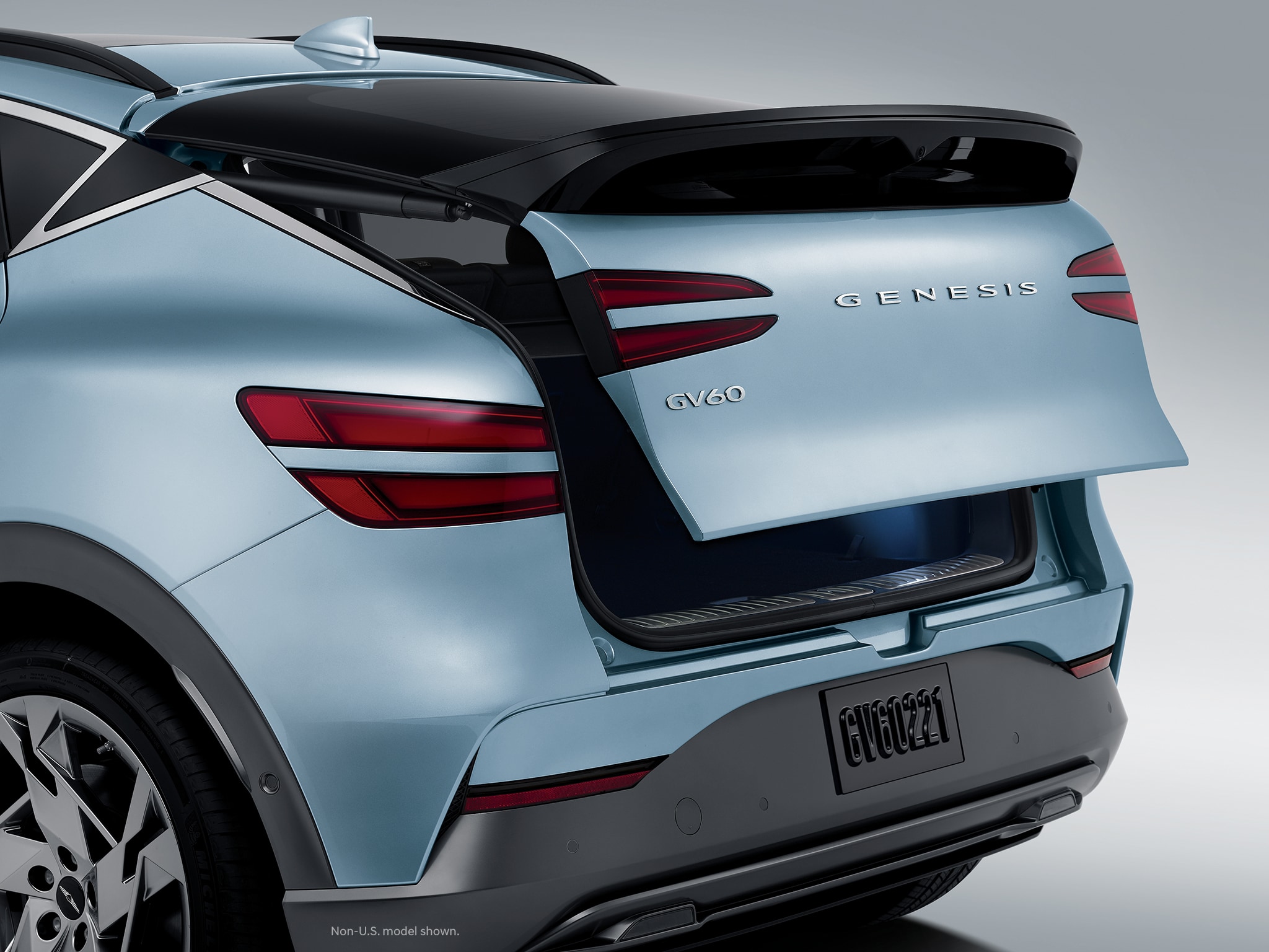 2023 Genesis GV60 shown in Hanauma Mint with trunk ajar.