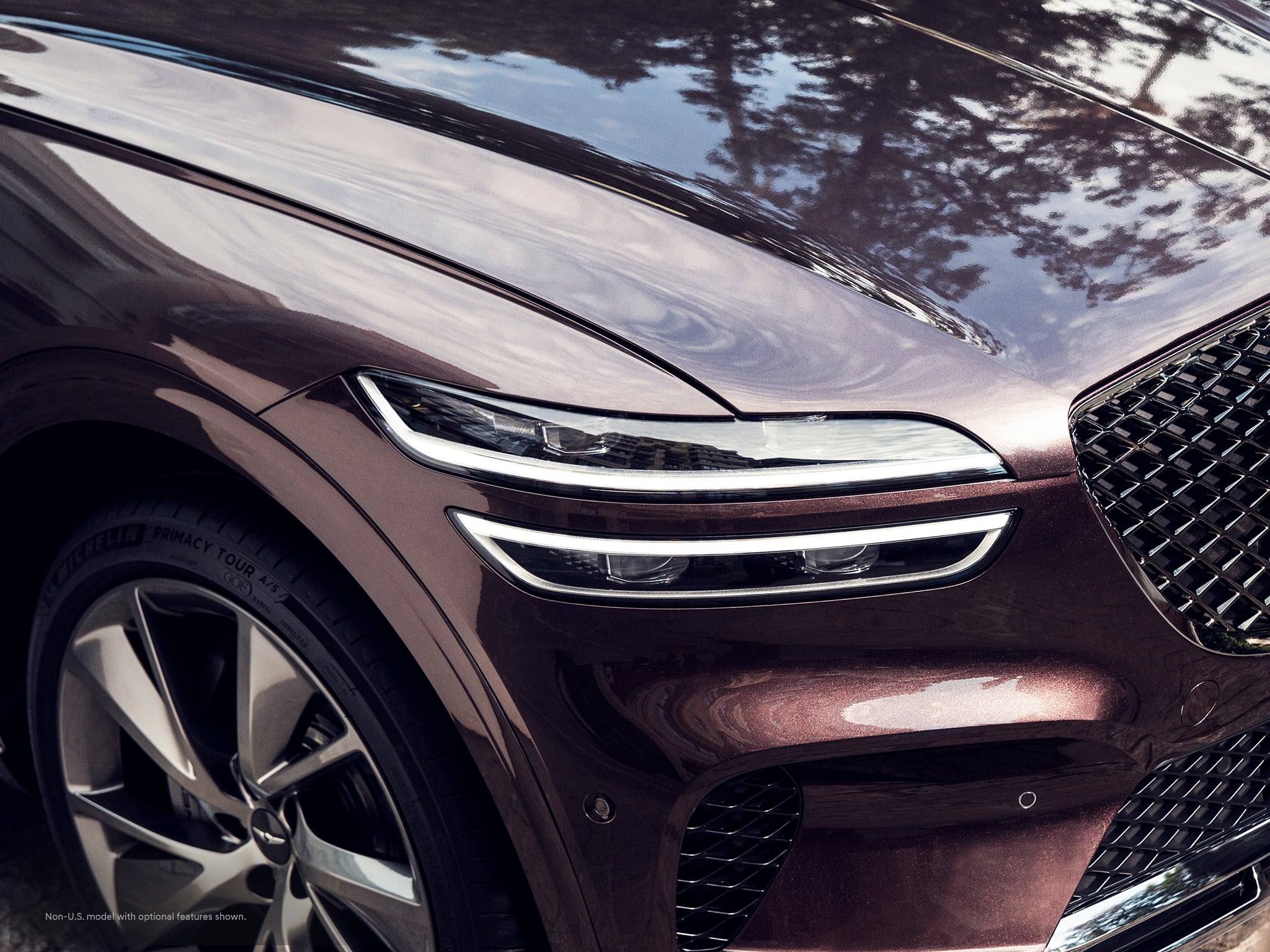 2023 Genesis GV70 shown in Barossa Burgundy.