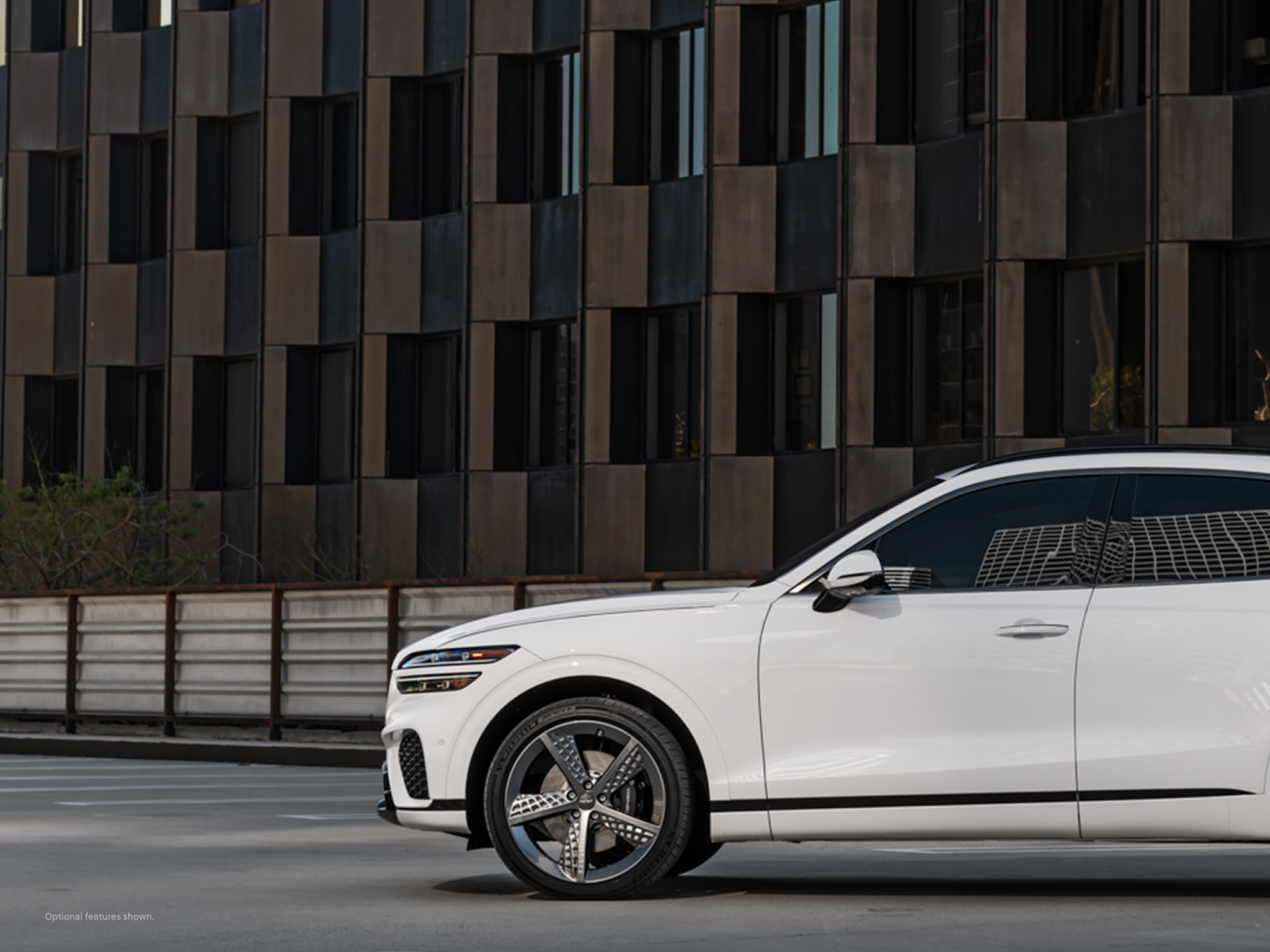 2023 Genesis GV70 shown in Alta White.