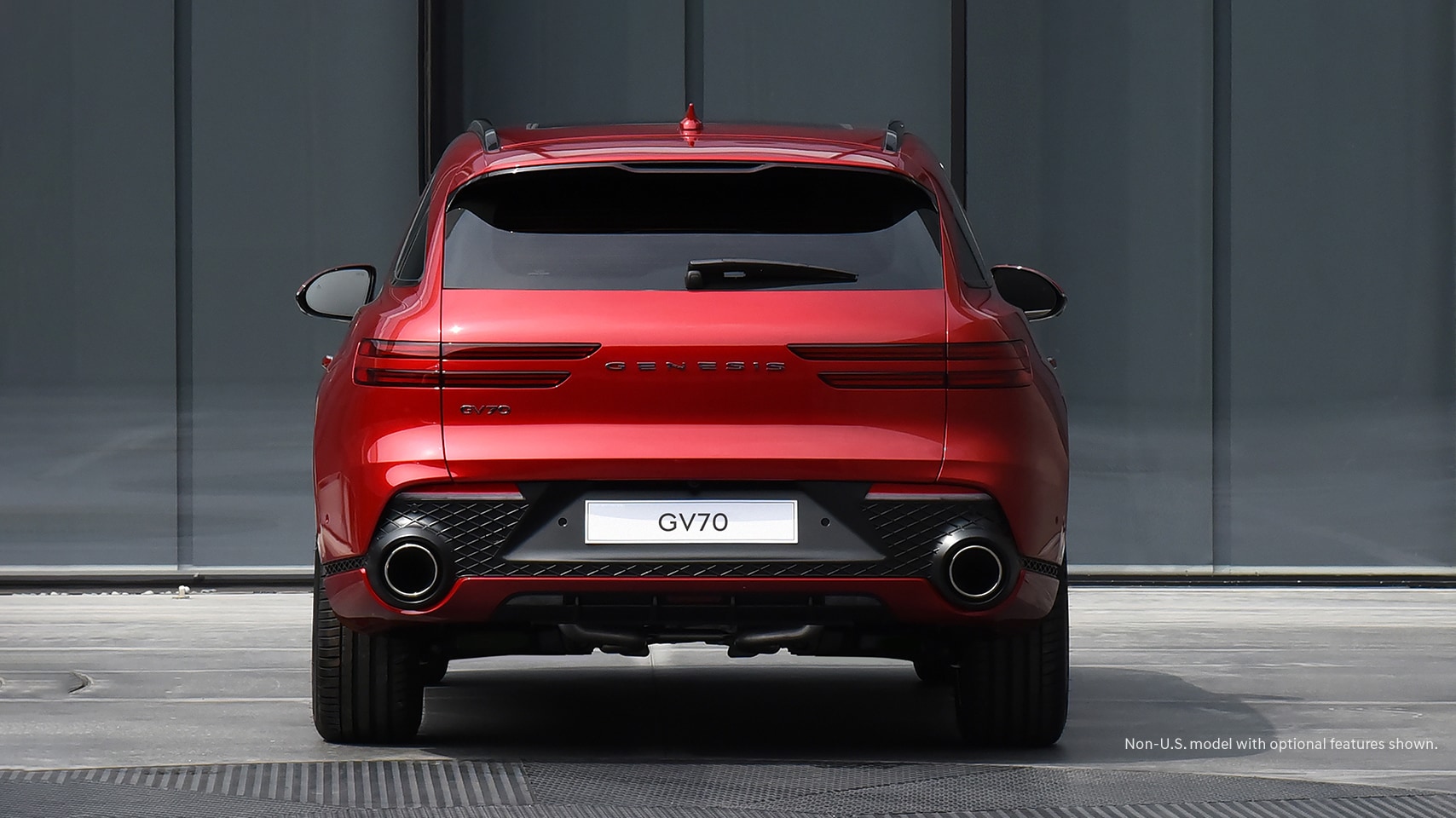 2023 Genesis GV70 shown in Mauna Red.