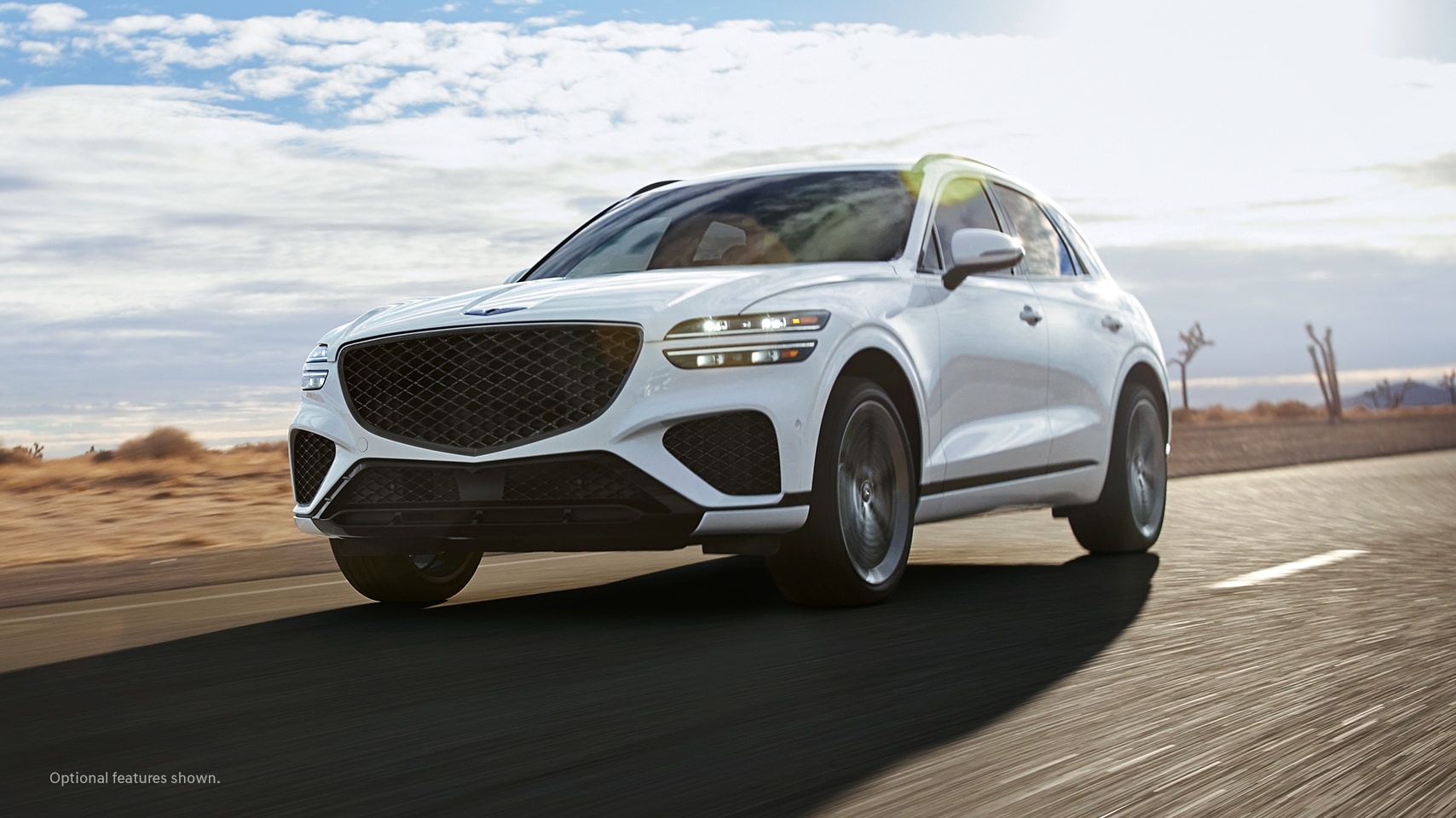 2023 Genesis GV70 shown in Alta White.