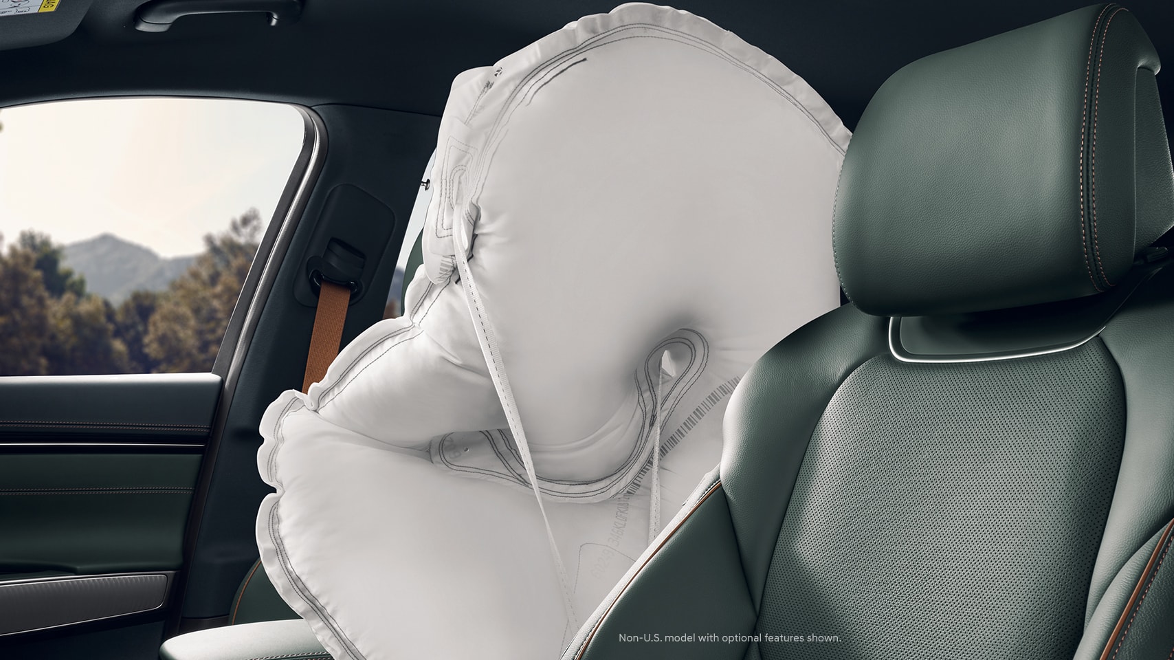 2023 Genesis GV70 interior with airbags deployed.