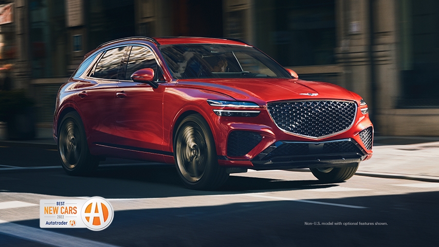 2022 Genesis GV70 shown in Mauna Red with the Autotrader award logo.