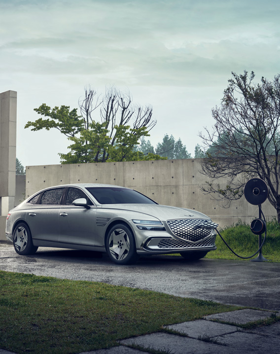 Front view of the Genesis G80 EV parked.