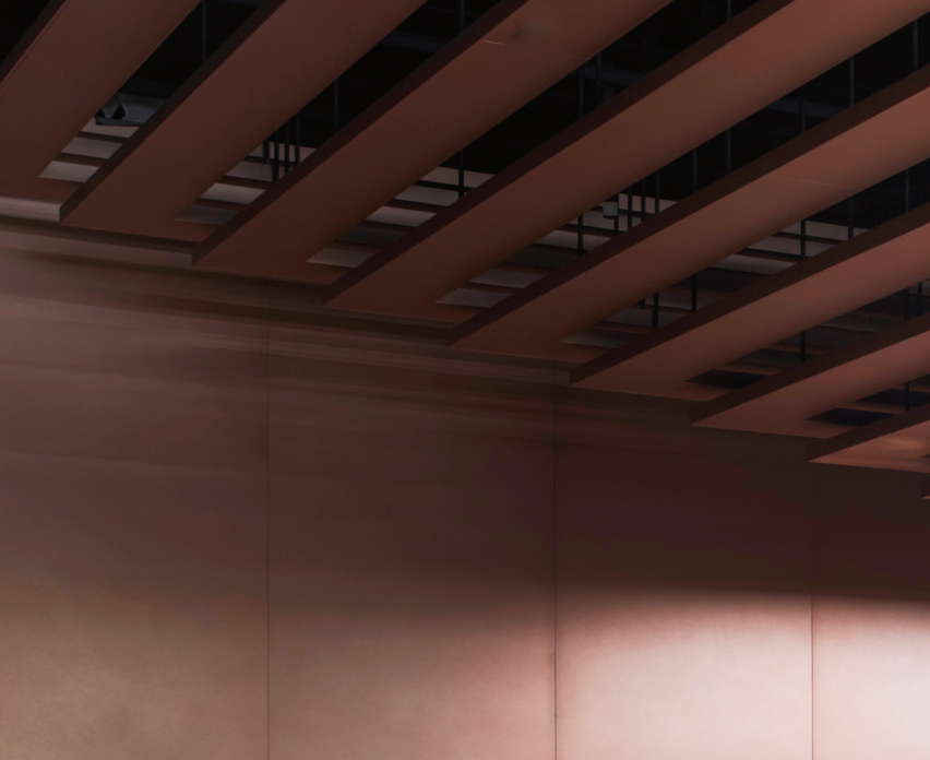 Flat brown panels of weathered steel.
